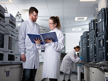 Eurofins employees planning method development and validation activities in lab