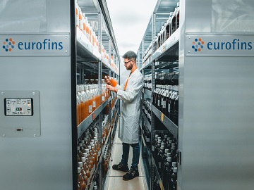Eurofins employee storing medical device in the stability storage room for stability testing